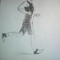 le jogger de profil en plein mouvement
